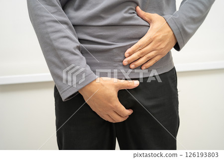 Hernia, Asian man stomach ache, abdominal pain and urology problem health. Hernia, Asian man stomach ache, abdominal pain and urology problem health. 126193803