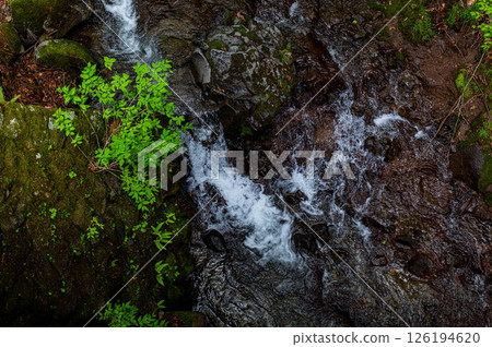 Mountain stream and small waterfall Mountain stream and small waterfall 126194620