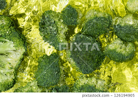 Fresh Broccoli Floating in Water, Top View. Fresh Broccoli Floating in Water, Top View. 126194905
