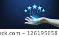 Hand of a woman holding five best star review scores or satisfaction. 126195658