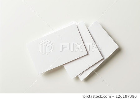 Business card mock up isolated on white background. Blank white card mockup from textured paper for design. Corporate office stationery set template. For text, logo branding. Empty cards pile flat lay 126197386