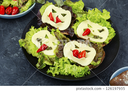 A group of sandwiches with Halloween decorations. A group of sandwiches with Halloween decorations. 126197935