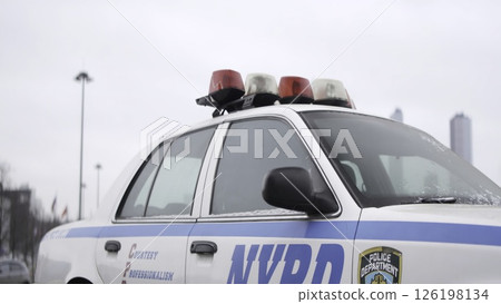 Nypd police car parked on city street. Action Nypd police car parked on city street. Action 126198134