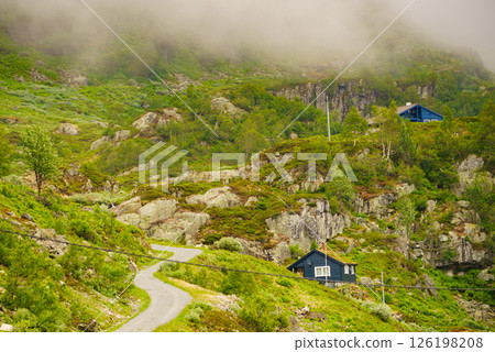 Norwegian country house in mountains. Norwegian country house in mountains. 126198208