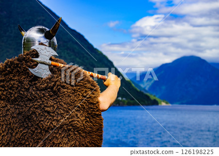 Viking warrior on fjord shore, Norway 126198225