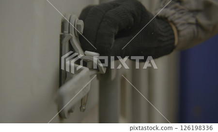 Close up of a metal lock on a storage container, showcasing its design and function. Stock Footage Close up of a metal lock on a storage container, showcasing its design and function. Stock Footage 126198336