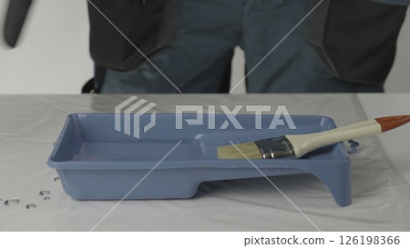 Prepare a paint tray for painting. Creative Prepare a paint tray for painting. Creative 126198366