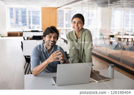 Portrait of two Indian professional workers posing for camera 126198404