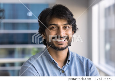 Head shot portrait of happy Indian businessman 126198560