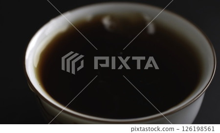 The Art of Pouring Hot Tea into a Beautiful Cup is a true delightful experience. Media 126198561