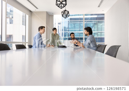 People engaged in professional business meeting in modern boardroom 126198571