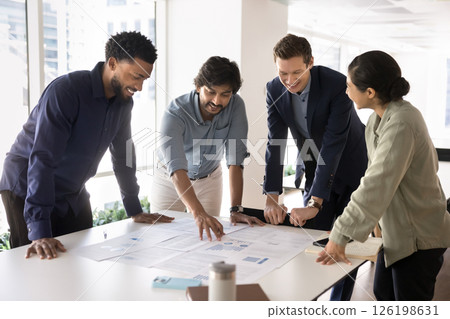 Multiethnic corporate team engaged in positive, productive meeting Multiethnic corporate team engaged in positive, productive meeting 126198631