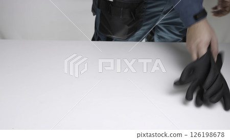 Video shows a person preparing a safe environment with PPE. Creative Video shows a person preparing a safe environment with PPE. Creative 126198678