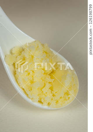Traditional Indian Ghee In Spoon, Golden Texture. Traditional Indian Ghee In Spoon, Golden Texture. 126198799