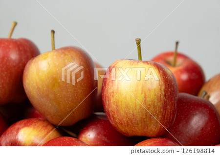 Close-Up View of a Group of Fresh Ripe Red Apples 126198814