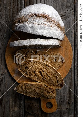 Top view on appetizing rye sourdough bread slices Top view on appetizing rye sourdough bread slices 126199076