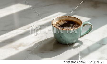 Coffee cup placed on a marble surface 126199129