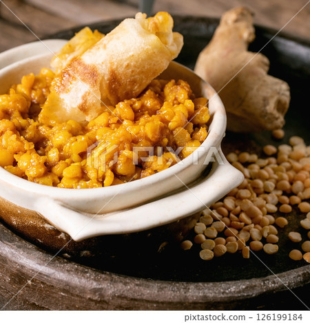 Traditional indian yellow pea food dal with roti bread Traditional indian yellow pea food dal with roti bread 126199184