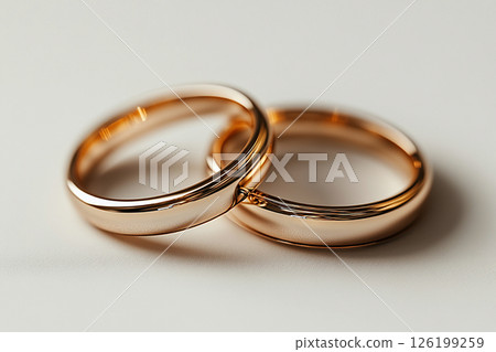 Pair of Wedding Rings on a white background. 126199259