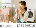 Woman hanging out in the room 126199516