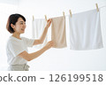 Woman hanging out in the room 126199518