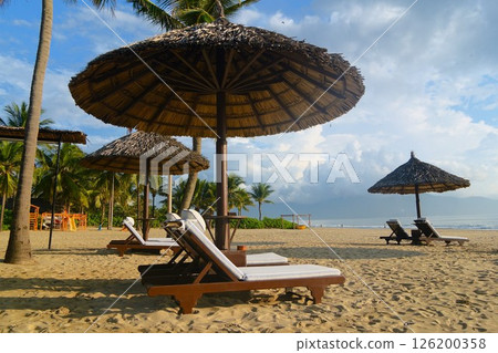 Umbrellas on the beach at a resort hotel 126200358