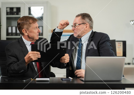 Male colleague caucasian angry and blames the team for poor work, the team failure is not satisfied with the report. Male colleague caucasian angry and blames the team for poor work, the team failure is not satisfied with the report. 126200480