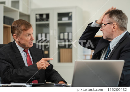 Male colleague caucasian angry and blames the team for poor work, the team failure is not satisfied with the report. Male colleague caucasian angry and blames the team for poor work, the team failure is not satisfied with the report. 126200482