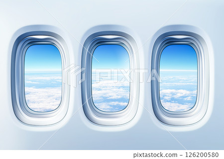 Airplane windows with blue sky and clouds Airplane windows with blue sky and clouds 126200580