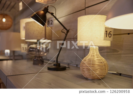 Beautifully designed lamps that features numbers on it in a store setting 126200958