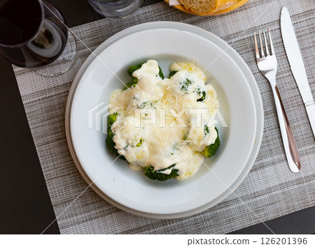 Broccoli and cauliflower gratin with cheese. Broccoli and cauliflower gratin with cheese. 126201396