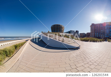 Modern Coastal Walkway with Ocean View and Unique Architecture in Bright Daylight 126201544