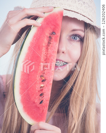 woman holding watermelon fruit woman holding watermelon fruit 126202406