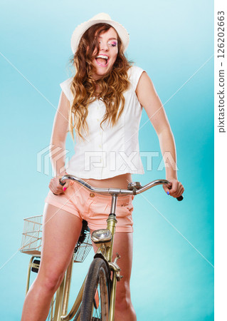 Active woman riding bike bicycle. Recreation. Active woman riding bike bicycle. Recreation. 126202663