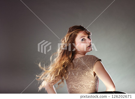 Mysterious enigmatic attractive woman girl. Mysterious enigmatic attractive woman girl. 126202671
