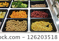 Colorful Salad Bar with Fresh Vegetables and Beans. 126203518