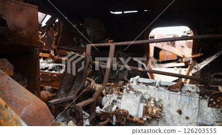 Rusty and burned-out armored vehicles on ukrainian territory. Exhibition of destroyed military equipment of the russian army. War between Ukraine and russia. Close up Slow motion 126203555