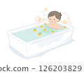 A middle-aged woman relaxing in a yuzu bath 126203829