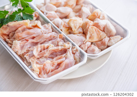 Chicken belly and thighs Chicken belly and thighs 126204302