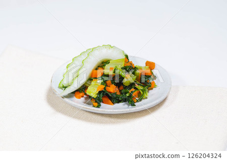 Stir-fried celery leaves and carrots Stir-fried celery leaves and carrots 126204324