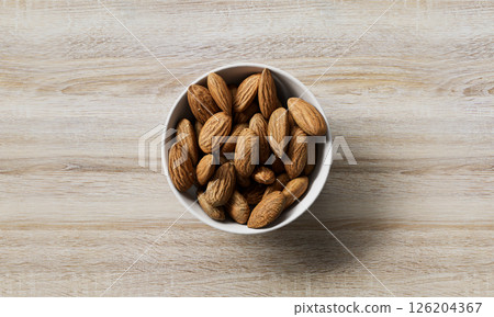 Almonds on a Wooden Table. 3D Rendering. Almonds on a Wooden Table. 3D Rendering. 126204367