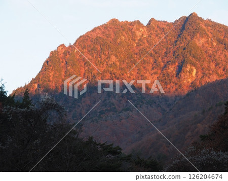 The morning glow of Mount Keikan as seen from Nishizawa Valley 126204674