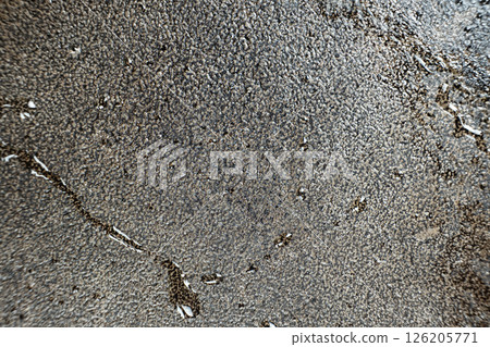 Water droplets on a cast iron macro surface. Cast iron cookware care, rust resistant, abstract pattern 126205771