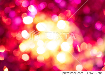 Festive blurred Christmas background, shining pink and yellow lights 126205784