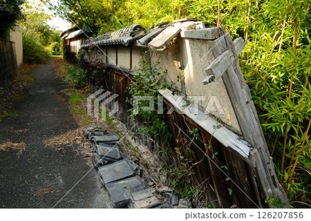 Dilapidated house wall 126207856