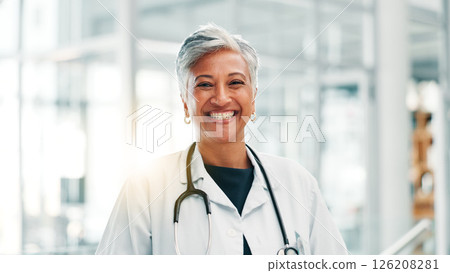 Hospital, doctor and portrait of woman with stethoscope and happy for medical service, career and job. Healthcare, professional and mature person with equipment for cardiology, pulmonary and wellness 126208281