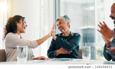Business people, high five and achievement in celebration, promotion or negotiation success at office. Employees, team announcement or group applause for partnership, prize or contract goal meeting Business people, high five and achievement in celebration, promotion or negotiation success at office. Employees, team announcement or group applause for partnership, prize or contract goal meeting 126208431