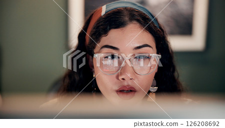 Business, woman and reading on computer in office of research, feedback email and financial report. Female person, glasses and online for budget review, finance information and data entry of proposal 126208692