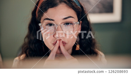 Thinking, woman and reading on computer in office of research, email feedback and financial report. Female person, glasses and online with budget review, finance information and planning for proposal Thinking, woman and reading on computer in office of research, email feedback and financial report. Female person, glasses and online with budget review, finance information and planning for proposal 126208693