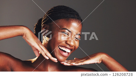 Black woman, hands and face in studio for skincare in portrait, excited or results by background. African person, girl and smile for change with beauty, glow or cosmetics with mockup space in Nigeria Black woman, hands and face in studio for skincare in portrait, excited or results by background. African person, girl and smile for change with beauty, glow or cosmetics with mockup space in Nigeria 126208728